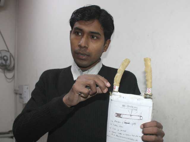 Instrument That Will Absorb The Smoke Of Cigarette