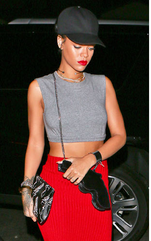 Rihanna with gun purses
